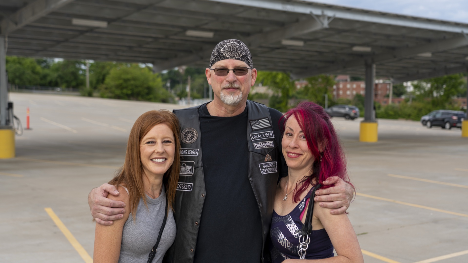 Chuck DeMoulin, EWRC1 Treasurer, with his wife (right) and her friend (left) at a club gathering.