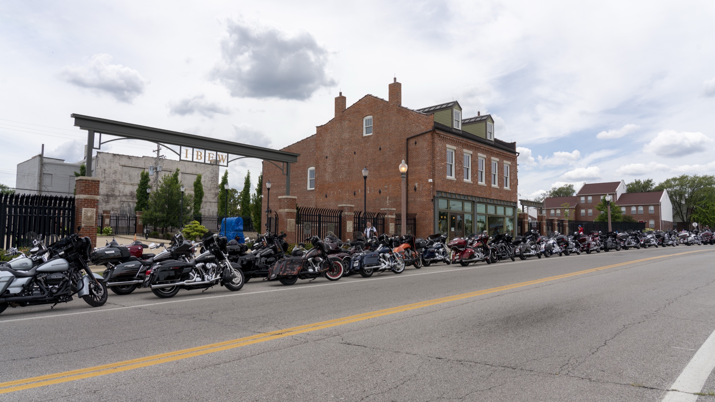 Motorcycles lined up at the IBEW Local 1 hall gate on the morning of the Greg Booth Ride.